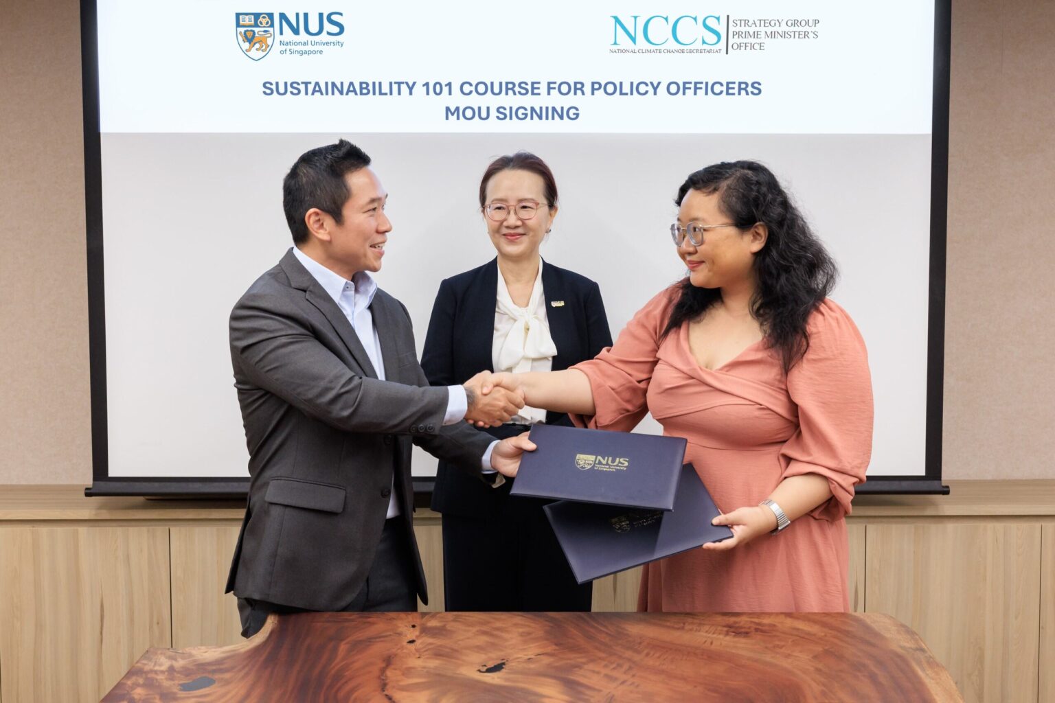 The MOU signing ceremony between Professor Koh Lian Pin, Director of NUS-CNCS (left) and Ms. Gayle Goh, Director (Planning), NCCS (right). The event was witnessed by Professor Susanna Leong, Vice Provost of Master’s Programmes & Lifelong Education, NUS.