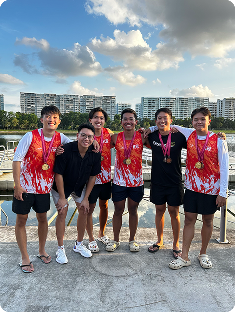 Justin with NUS Dragon Boat teammates
