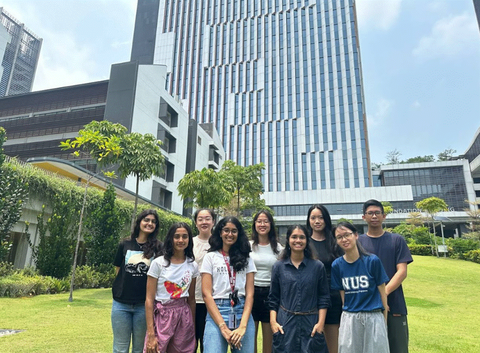 Sruthi (first row, second from right) with the NUS Life Sciences Society’s Academic Affairs department at the NUS Faculty of Science.